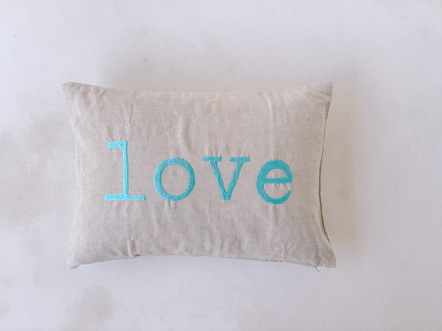 Linen cushions with embroidery Love